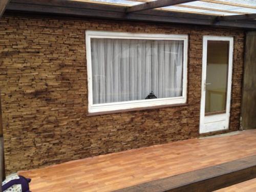 Вашему вниманию наше воплощение идеи отделки стены деревянной мозаикой. 06